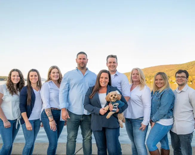 northern living team with lake geroge in the background