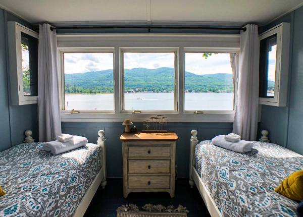 Crawford House bedroom with view of the lake out the window
