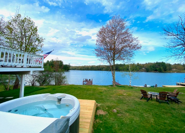 Lakeshore Cottage view from hot tub looking at the water